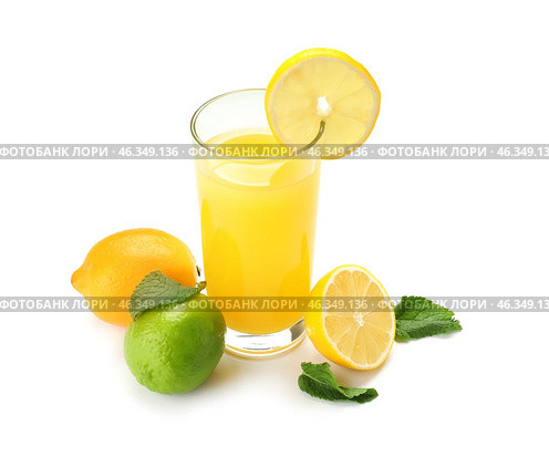 Glass of fresh lemon juice on white background. Стоковое фото, фотограф Pixel_shot / Фотобанк Лори