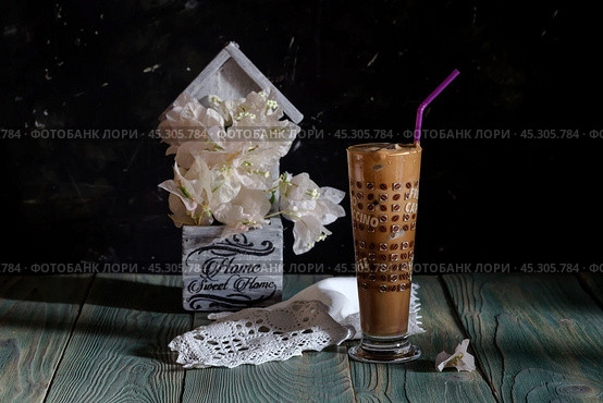 Glassful with cold coffee close-up. Стоковое фото, фотограф Татьяна Ляпи / Фотобанк Лори