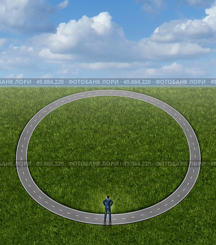 Going in circles and career problems business concept with no change in status as a businessman on a pointless circular repeating road as a symbol of stagnation and wasted time by following a useless path to nowhere. Стоковое фото, агентство Ingram Publishing / Фотобанк Лори
