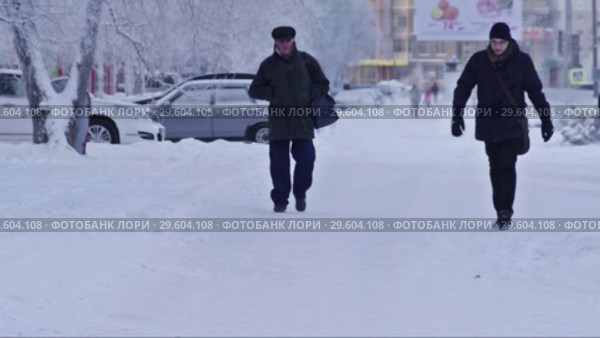 Город Сургут зимой. Уличное движение. Surgut. City in the winter. Street traffic. (2017 год). Редакционное видео, видеограф Евгений Романов / Фотобанк Лори