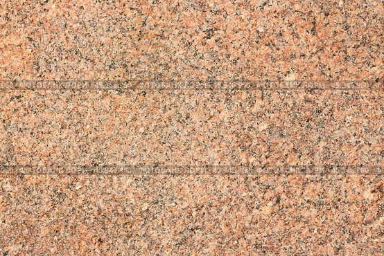 Granite texture. Natural granite with a grainy pattern. Stone background. Solid rough surface of rock. Durable construction and decoration material. Close-up. Стоковое фото, фотограф Андрей Степанов / Фотобанк Лори