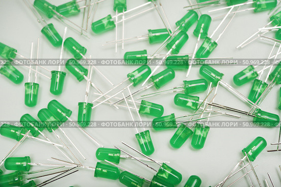 Green LED lamps. A scattering of electronic elements. Light-emitting diodes. Стоковое фото, фотограф Valeriy Lushchikov / Фотобанк Лори