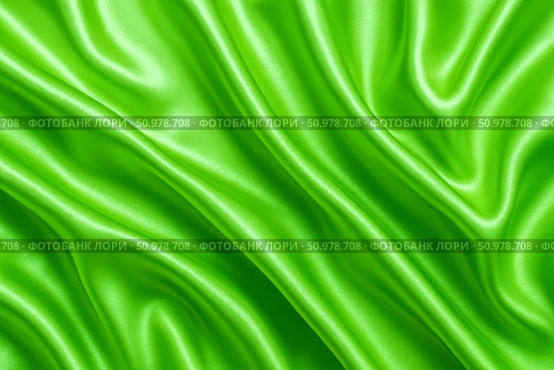 Green silk satin fabric background with shiny flowing folds, elegant surface, luxury textile texture for fashion, spa, wedding, creative design. Стоковое AI-изображение, AI-художник Павел Муравьев / Фотобанк Лори
