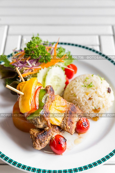 grilled beef skewer with fried rice. Стоковое фото, агентство Ingram Publishing / Фотобанк Лори