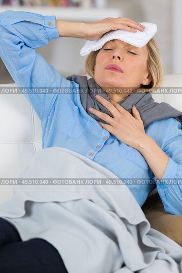health and illness concept - indoor picture of diseased woman. Стоковое фото, агентство Ingram Publishing / Фотобанк Лори