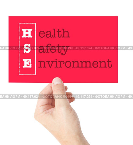 Health Safety Environment explained on a card held by a hand. Стоковое фото, агентство Ingram Publishing / Фотобанк Лори
