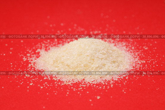 heap of gelatin on a red background. joint supplement. Стоковое фото, фотограф Поликарпов Владимир Владимирович / Фотобанк Лори