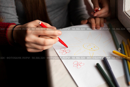 high angle girl with down syndrome woman drawing. Стоковое фото, агентство Ingram Publishing / Фотобанк Лори