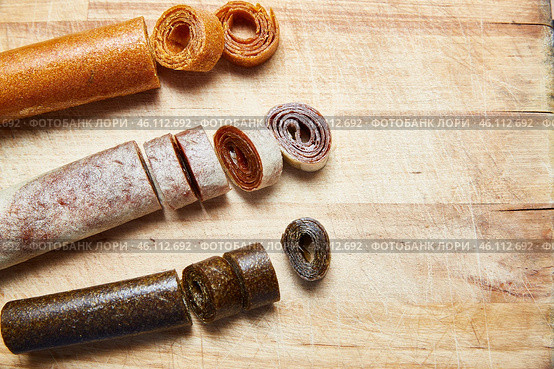 Homemade fruit rolls , candy pastilles for a healthy breakfast concept. Стоковое фото, фотограф Кутина Татьяна / Фотобанк Лори