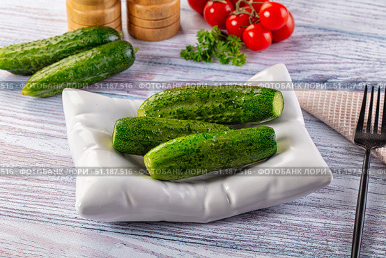 Homemade lightly salted cucumbers snack. Стоковое фото, фотограф Андрей Старостин / Фотобанк Лори