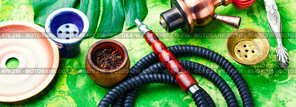 Hookah mouthpiece.Shisha aroma.Tabak with tropical flavor.Kalian smoking. Arabia shisha with tobacco. Стоковое фото, агентство Ingram Publishing / Фотобанк Лори