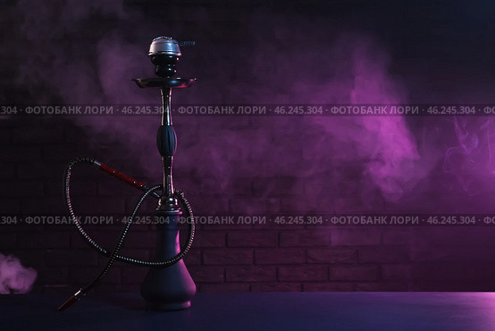 Hookah with fume on dark background. Стоковое фото, фотограф Pixel_shot / Фотобанк Лори
