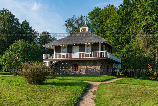 House-Museum of A. P. Hannibal in the Petrovskoye estate of the natural landscape Reserve of A. S. Pushkin on a sunny summer day, Pushkinskie Gory, Pskov region, Russia. Стоковое фото, фотограф Ula Ulachka / Фотобанк Лори