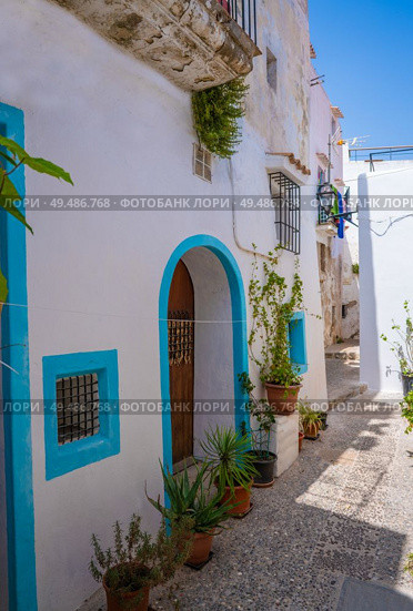 Ibiza Eivissa downtown Dalt Vila facades in Balearic Islands. Стоковое фото, агентство Ingram Publishing / Фотобанк Лори