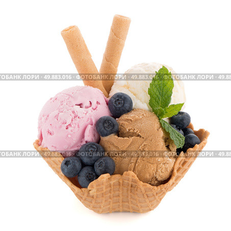 Ice cream scoops in wafer bowl on white background. Стоковое фото, агентство Ingram Publishing / Фотобанк Лори