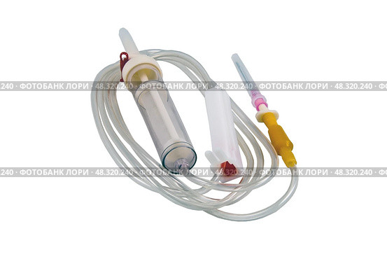 Иголки и трубки система для переливания крови на белом фоне.  Needle and tube blood transfusion system on white background. Стоковое фото, фотограф Татьяна Д / Фотобанк Лори