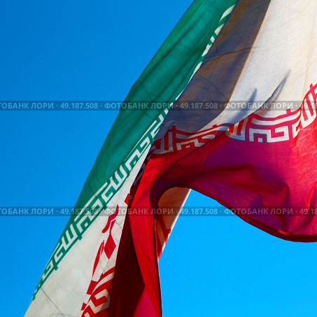 in iran blur  iranian waving flag  the blue sky and wind. Стоковое фото, агентство Ingram Publishing / Фотобанк Лори