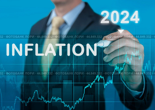 Inflation 2024. tax, cash flow and another financial concept. focused on decreasing value of money. blue background of graph of rising inflation rates 2023 2024 years. Стоковое фото, фотограф Павел Муравьев / Фотобанк Лори