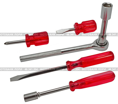 Инструменты - отвёртки и гаечные ключи на белом фоне.  Tools - screwdrivers and wrenches on a white background. Стоковое фото, фотограф Татьяна Д / Фотобанк Лори