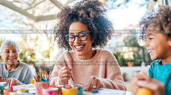 Intergenerational art: A family enjoys painting together, creating art and memories in a bright, cheerful space. Стоковое AI-изображение, AI-художник Данила Большаков / Фотобанк Лори
