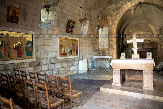 Interior of catholic church Apostle Paul in the city of Damascus. Stone cross, frescoes and icons. Republic of Syria. Стоковое фото, фотограф Евгений Ткачёв / Фотобанк Лори