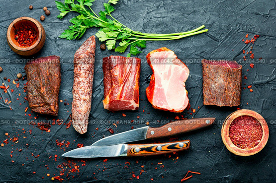 Italian meat platter.Cured meat and sausages.Long banner. Spanish cured meat. Стоковое фото, агентство Ingram Publishing / Фотобанк Лори