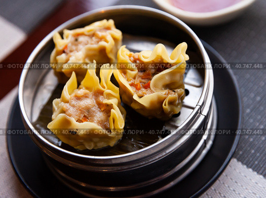 Japanese tasty dumplings siumai in steamer, nobody. Стоковое фото, фотограф Яков Филимонов / Фотобанк Лори