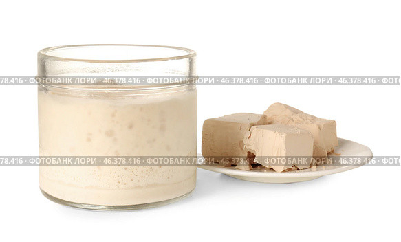 Jar with fresh sourdough and yeast on white background. Стоковое фото, фотограф Pixel_shot / Фотобанк Лори