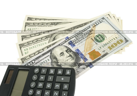 Калькулятор и доллары на белом фоне. Calculator and dollars isolated on a white background. Стоковое фото, фотограф Татьяна Д / Фотобанк Лори