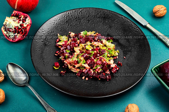 Keto or paleo diet, dietary healthy meal food diet. Beetroot salad with walnuts.. Beet salad beetroot. Стоковое фото, агентство Ingram Publishing / Фотобанк Лори