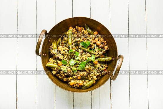 Kitchari,stewed rice with mash and spices fried in oil.Indian food. Kitchari, a spicy vegetarian dish. Стоковое фото, агентство Ingram Publishing / Фотобанк Лори