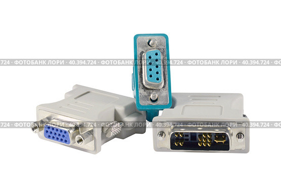 Компьютерные переходные разъемы - адаптеры. DVI to VGA adapter. Стоковое фото, фотограф Татьяна Д / Фотобанк Лори
