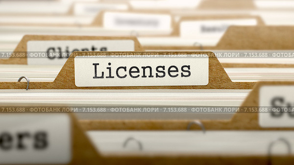 Концепция лицензирования. Надпись Licenses на карточке. Стоковая иллюстрация, иллюстратор Илья Урядников / Фотобанк Лори