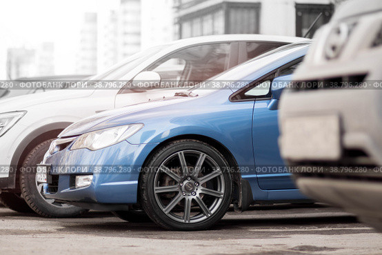 KRASNOYARSK, RUSSIA - April 2, 2021: Blue car. Sedan Honda Civic 4D FD1 2007. Beautifull wheels. Редакционное фото, фотограф Плотников Дмитрий / Фотобанк Лори
