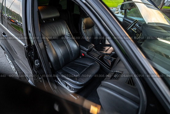 KRASNOYARSK, RUSSIA - May 23, 2025: Black BMW X5 E53. Редакционное фото, фотограф Плотников Дмитрий / Фотобанк Лори