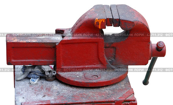 Красные тиски на белом фоне. Red vise on a white background. Стоковое фото, фотограф Татьяна Д / Фотобанк Лори