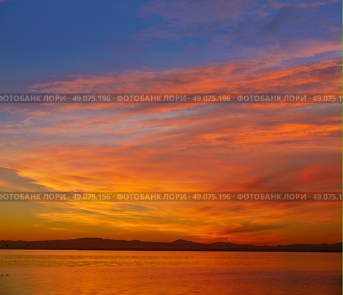 La Albufera lake sunset in El Saler of Valencia at Spain. Стоковое фото, агентство Ingram Publishing / Фотобанк Лори