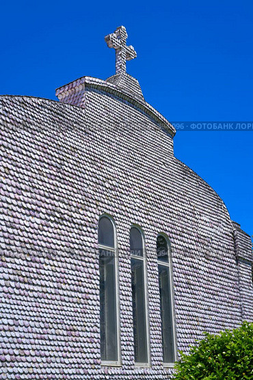 La toja island Toxa Chapel made of sea shells in Pontevedra Galicia Spain. Стоковое фото, агентство Ingram Publishing / Фотобанк Лори