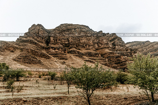 Landscape of Dagestan mountains, mountain range in haze summer Russia. Стоковое фото, фотограф Spirit River / Фотобанк Лори