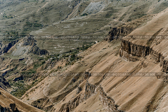 Landscape of Dagestan mountains, mountain range in haze summer Russia. Стоковое фото, фотограф Spirit River / Фотобанк Лори