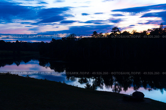 landscape sunset over the tropical lake in Thailand. Стоковое фото, агентство Ingram Publishing / Фотобанк Лори