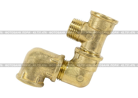 Латунный фитинг для поворота и соединения труб в сантехнике. Brass fitting for plumbing on the white background. Стоковое фото, фотограф Татьяна Д / Фотобанк Лори