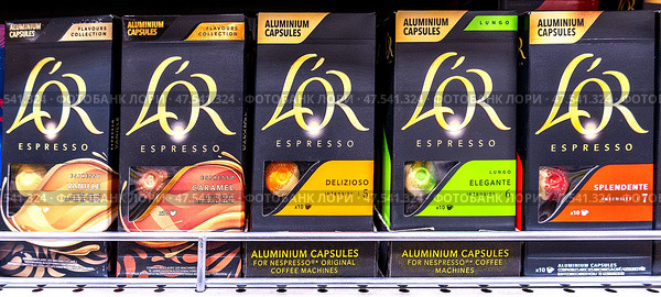 L'OR Capcule Coffee sale on the shelf in a super store. Редакционное фото, фотограф FotograFF / Фотобанк Лори