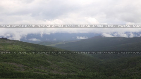 Low clouds and fog over mountains. Стоковое видео, видеограф Евгений Ткачёв / Фотобанк Лори