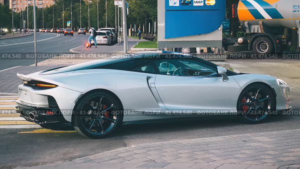 Luxurious super car McLaren GT on city street. Редакционное фото, фотограф Константин Григорьев / Фотобанк Лори