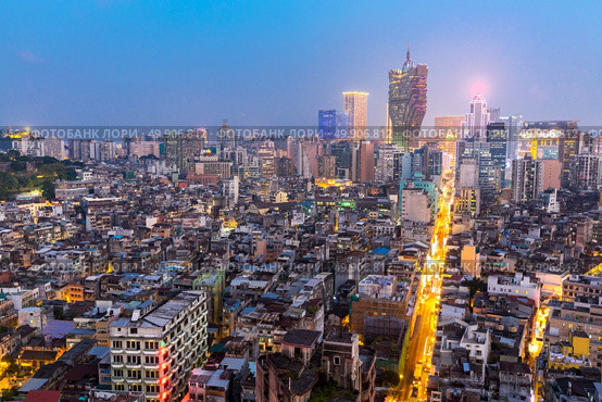 Macau cityscape skyline at dusk. Mocau now is part of China. Стоковое фото, агентство Ingram Publishing / Фотобанк Лори