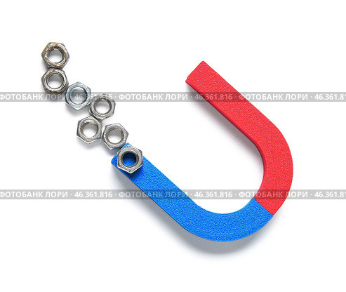 Magnet with screw nuts isolated on white background. Стоковое фото, фотограф Pixel_shot / Фотобанк Лори
