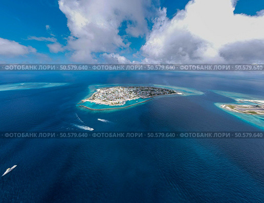 Maldives paradise scenery. Tropical aerial landscape, seascape with long jetty, water villas with amazing sea and lagoon beach, tropical nature. Exotic tourism destination banner, summer vacation. Стоковое фото, агентство Ingram Publishing / Фотобанк Лори
