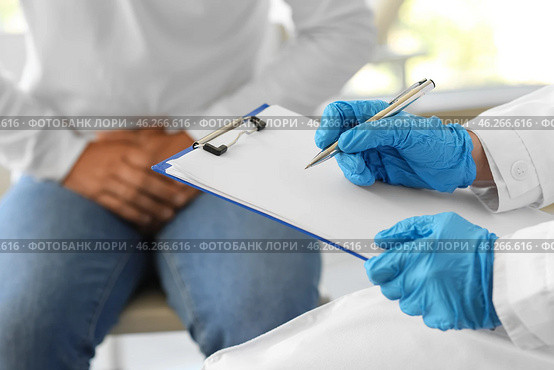 Male urologist with patient at hospital, closeup. Стоковое фото, фотограф Pixel_shot / Фотобанк Лори