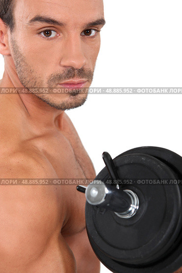 man lifting weight. Стоковое фото, агентство Ingram Publishing / Фотобанк Лори